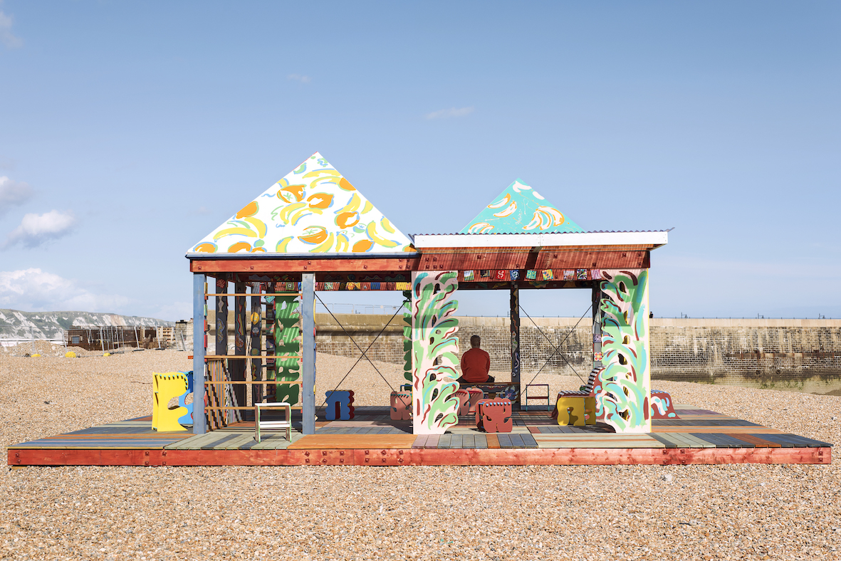 Sol Calero - A colourful house with open sides in a desert