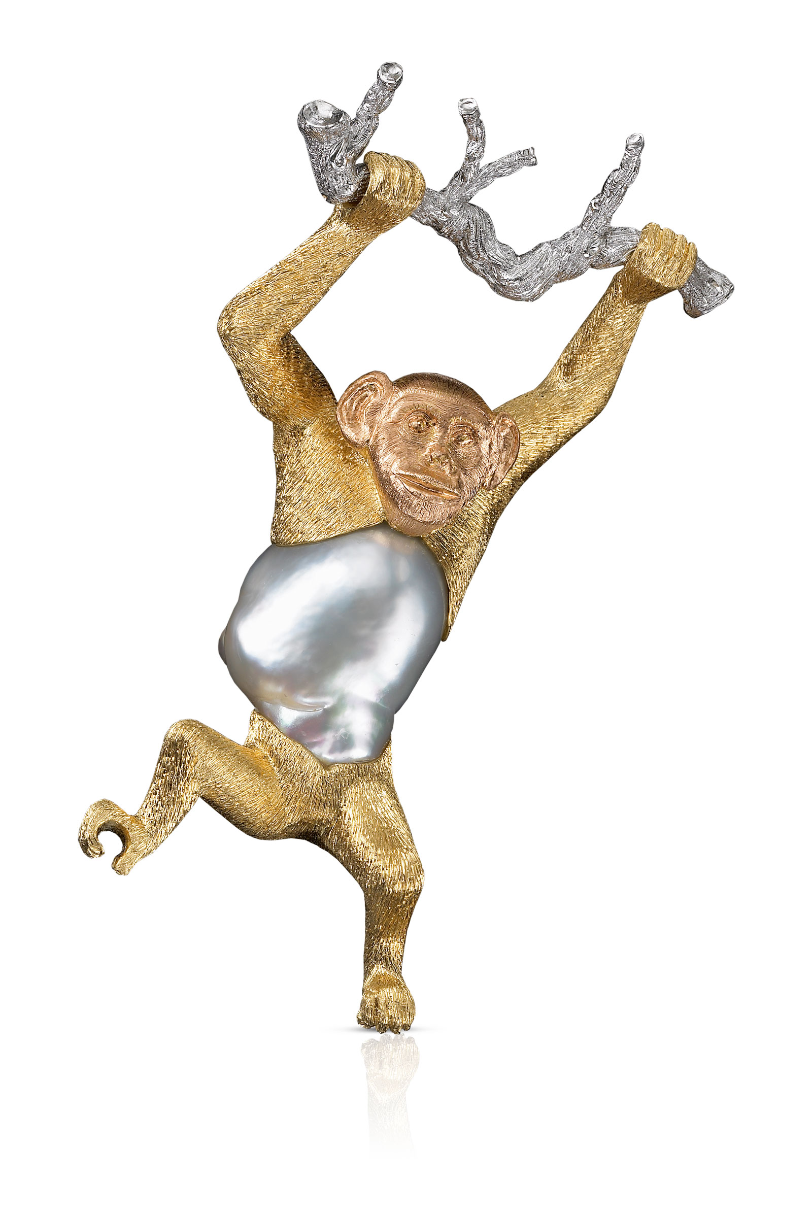 Bucellati’s one-off animal brooches include this monkey with a pink-gold head and baroque pearl for a belly monkey-brooche