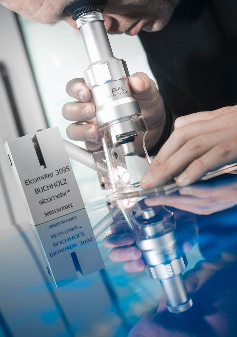 Testing the hardness of a coating at McLaren Large-3746Misc-18