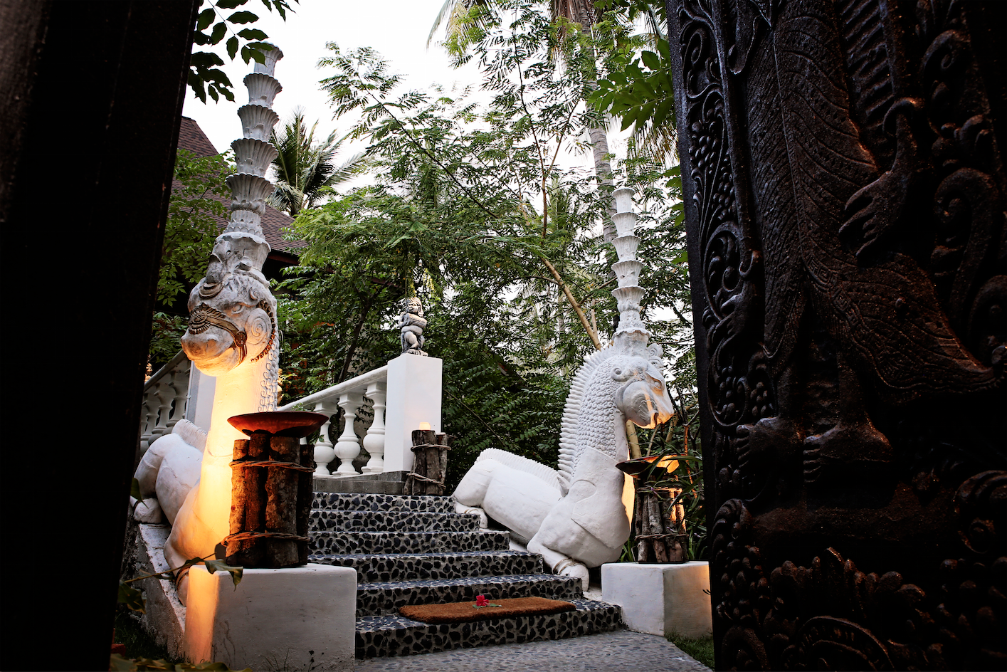 Majestic statues flank the walkways at the Tugu resort Majestic statues flank the walkways at the Tugu resort
