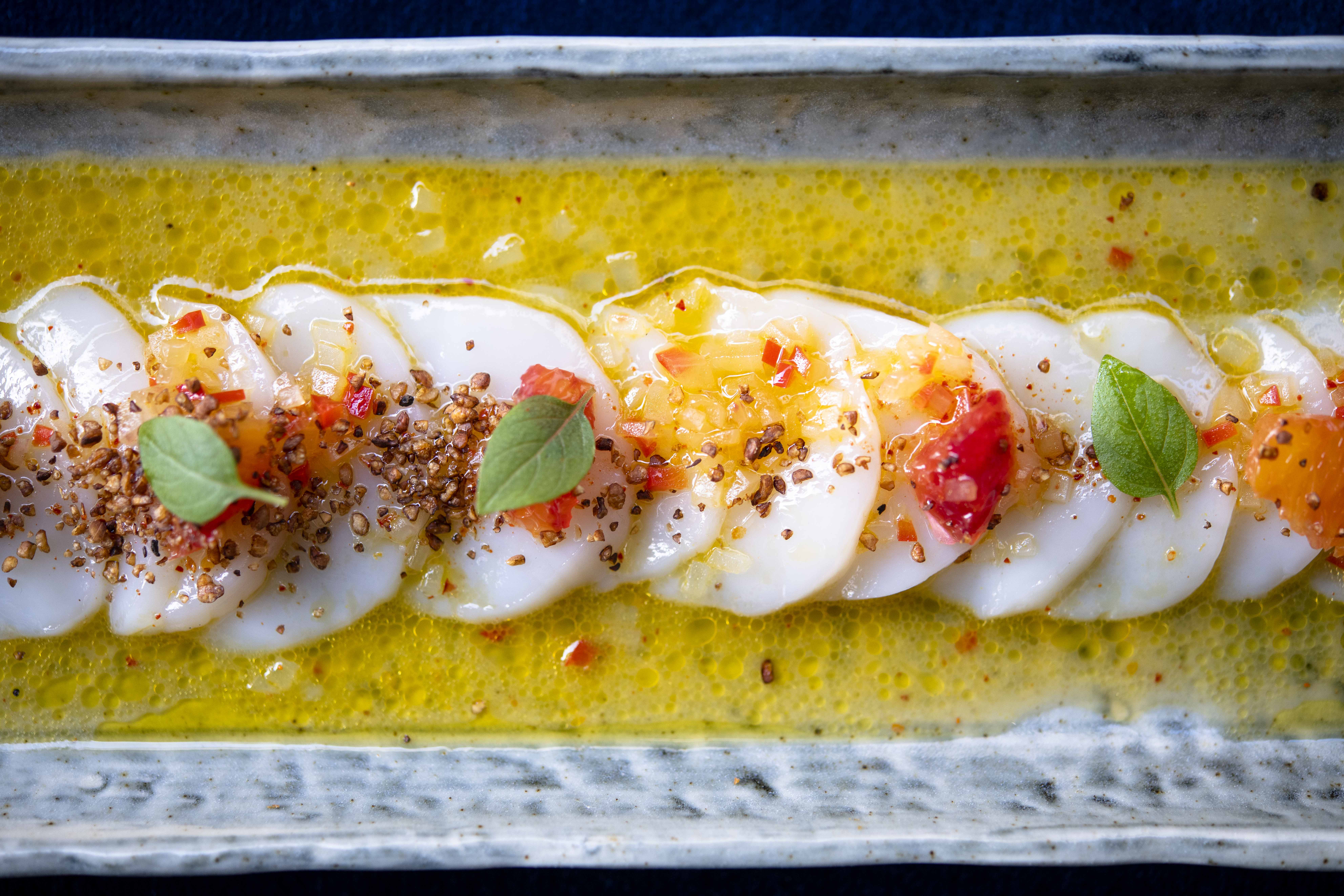 A plate of Yellowtail carpaccio