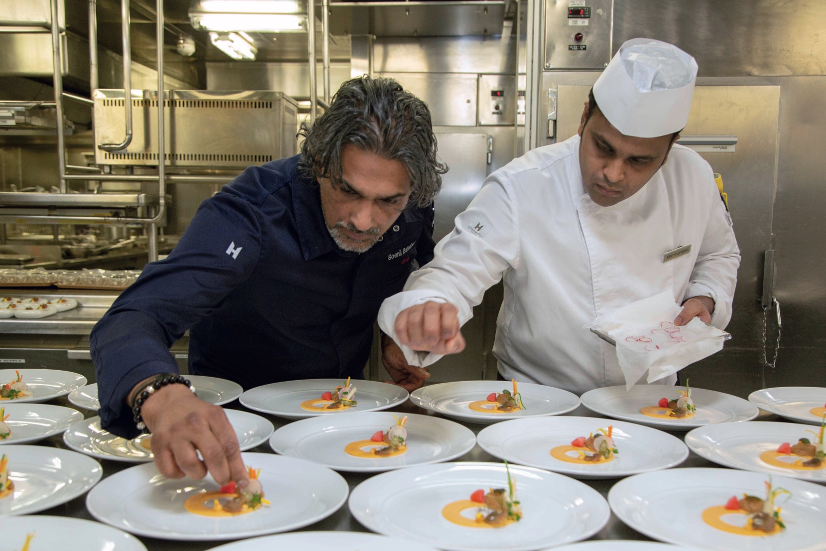 Guest chef Suenil, preparing food on 'The World'