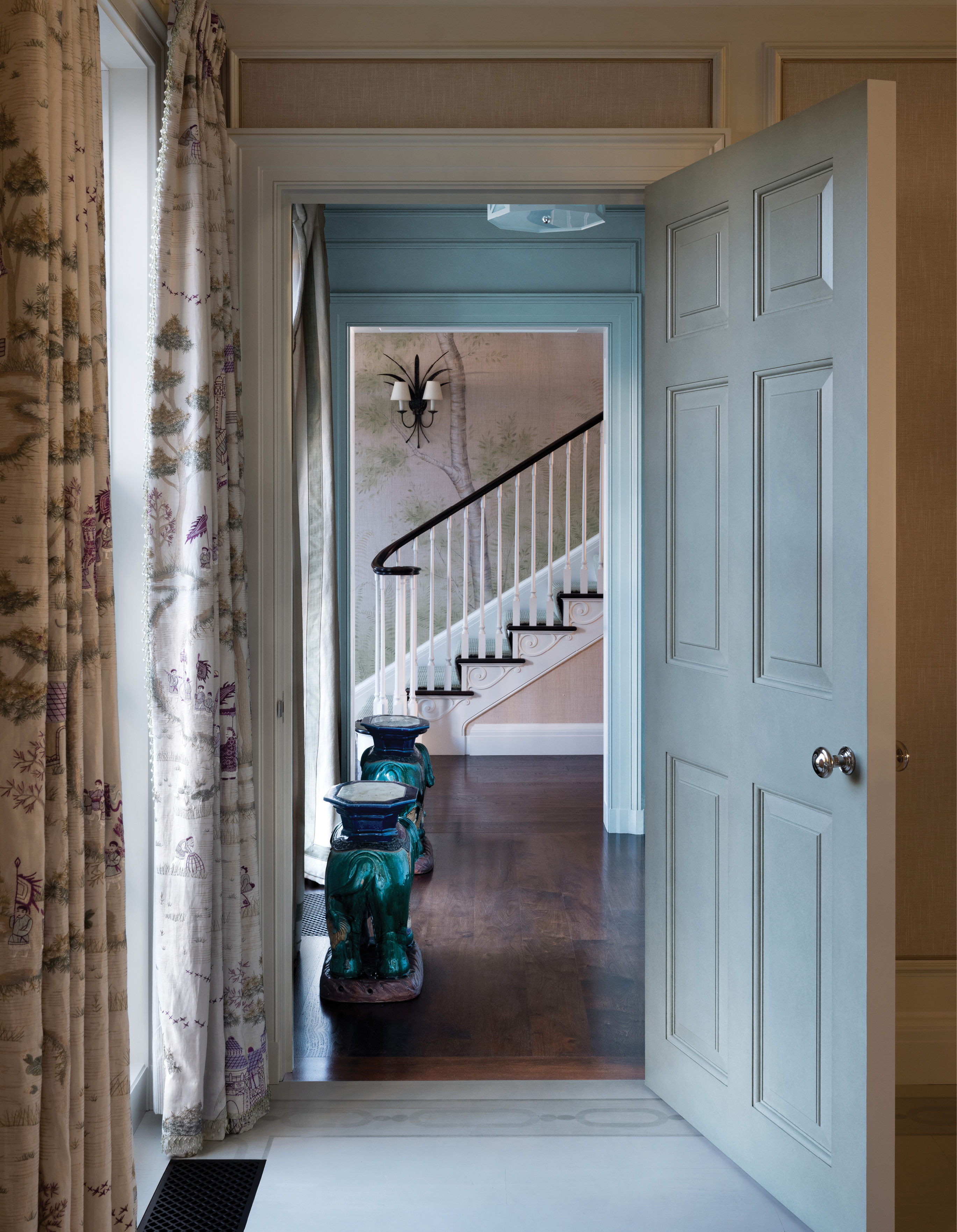 A view through to the stairwell designed by Nina Campbell