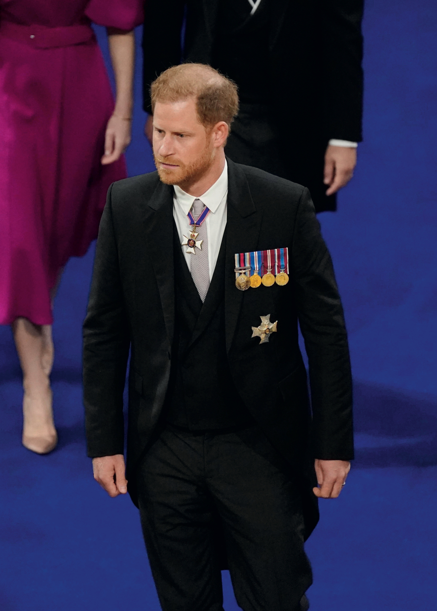 Prince Harry attending his father's Coronation