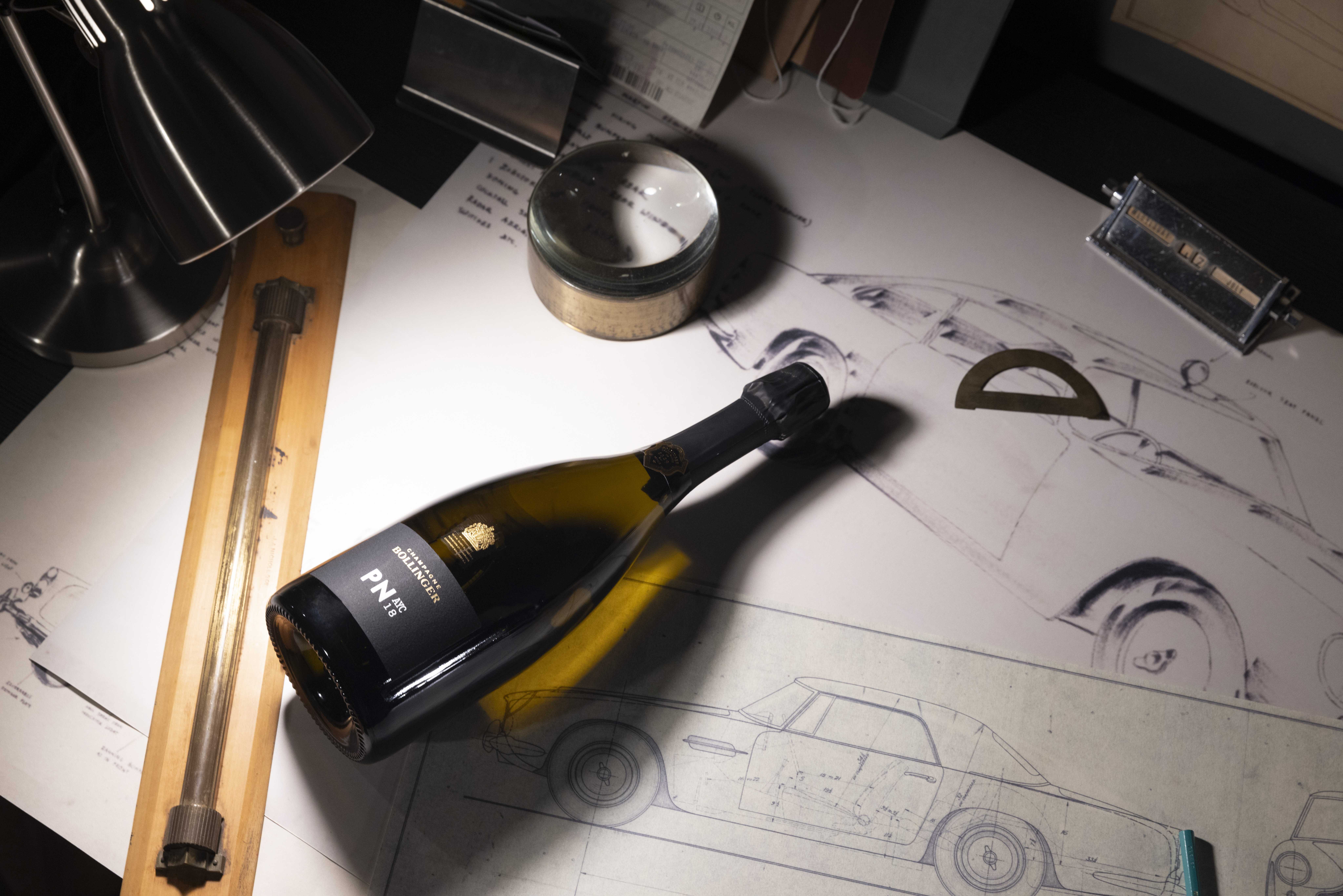 House of Q - drawings and a bottle of champagne House of Q - drawings and a bottle of champagne