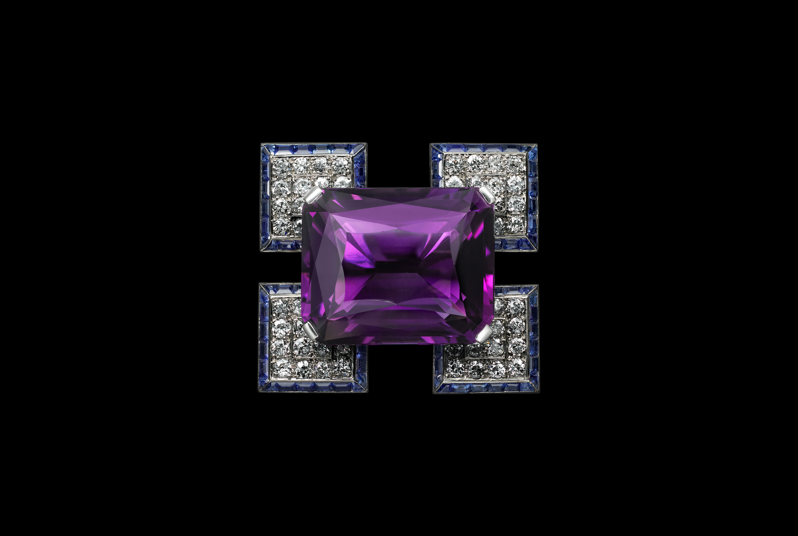 Square-shaped Cartier Amethyst and Sapphire brooch.