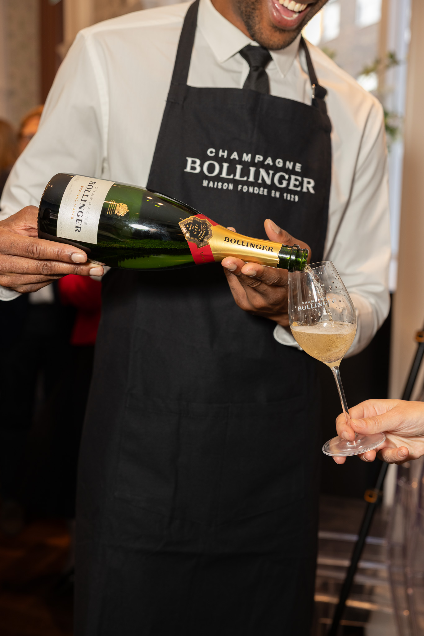 Bollinger Champagne is poured into a Bollinger glass