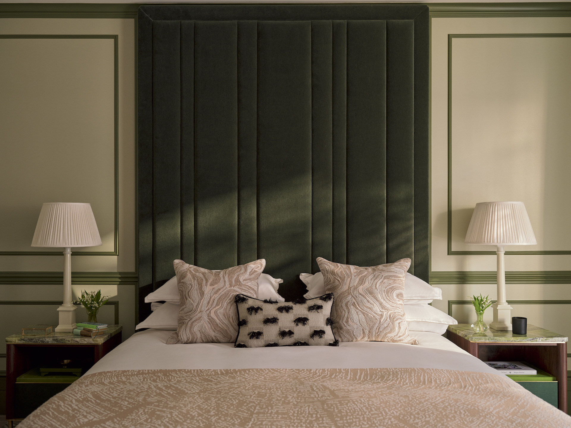 A mohair bed with Art Deco design in a luxury apartment at The Whiteley.