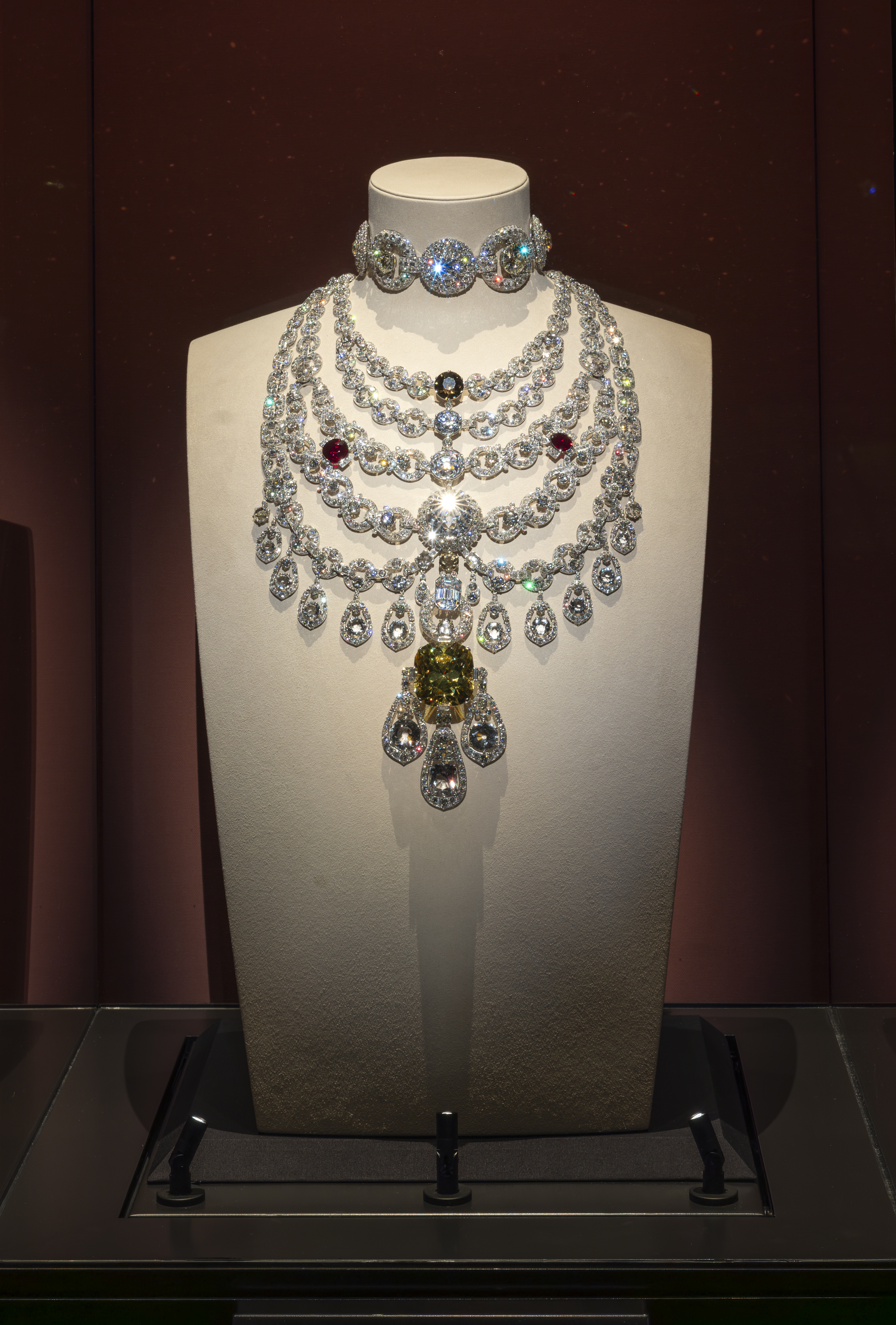 Cartier layered Patiala Necklace Commissioned by Bhupinder Singh, Maharajah of Patialaon a white neck mannequin Cartier exhibition V&A.