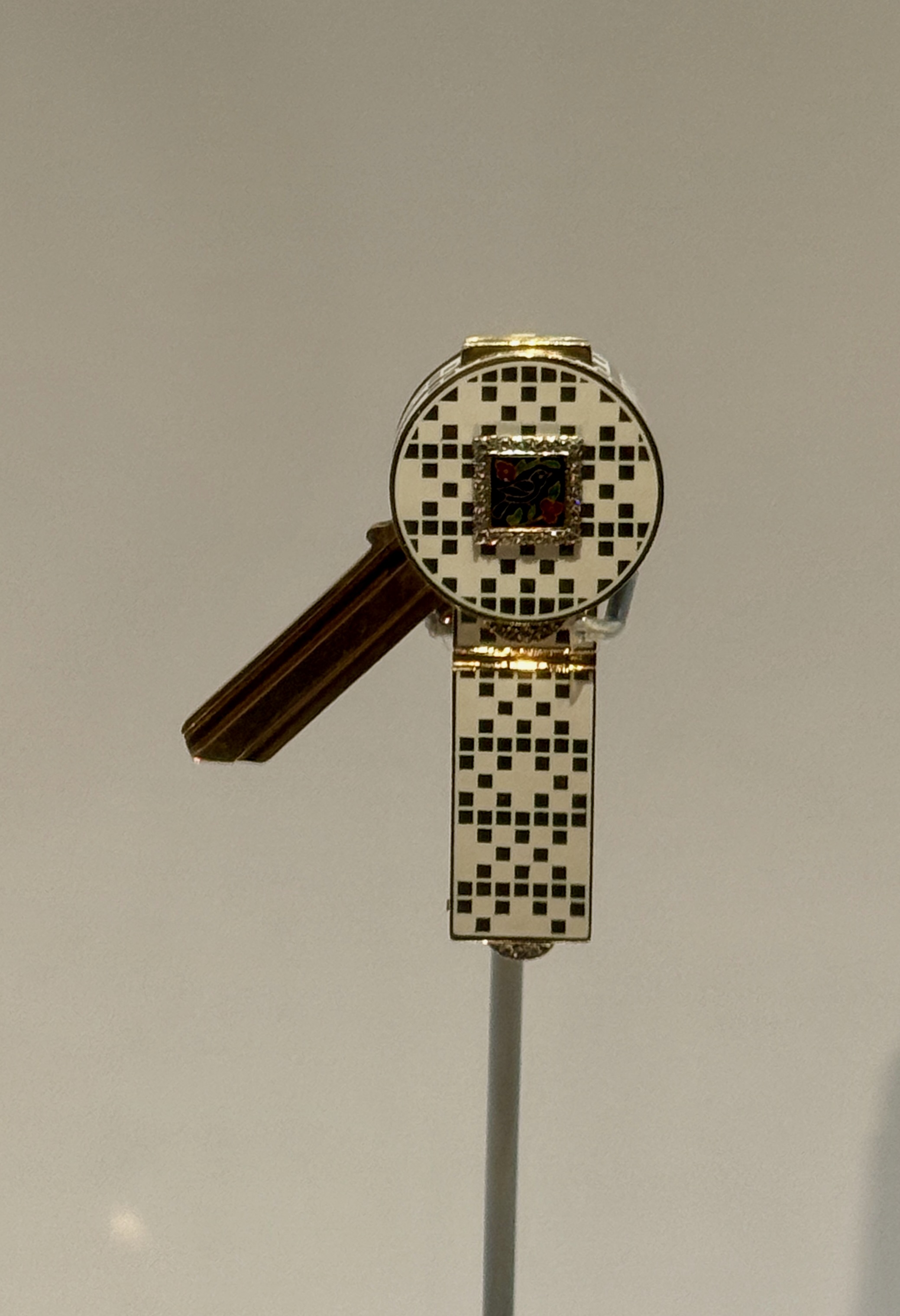 Freddie Mercury's Cartier mini vanity case with a gold key, on display at the V&A.