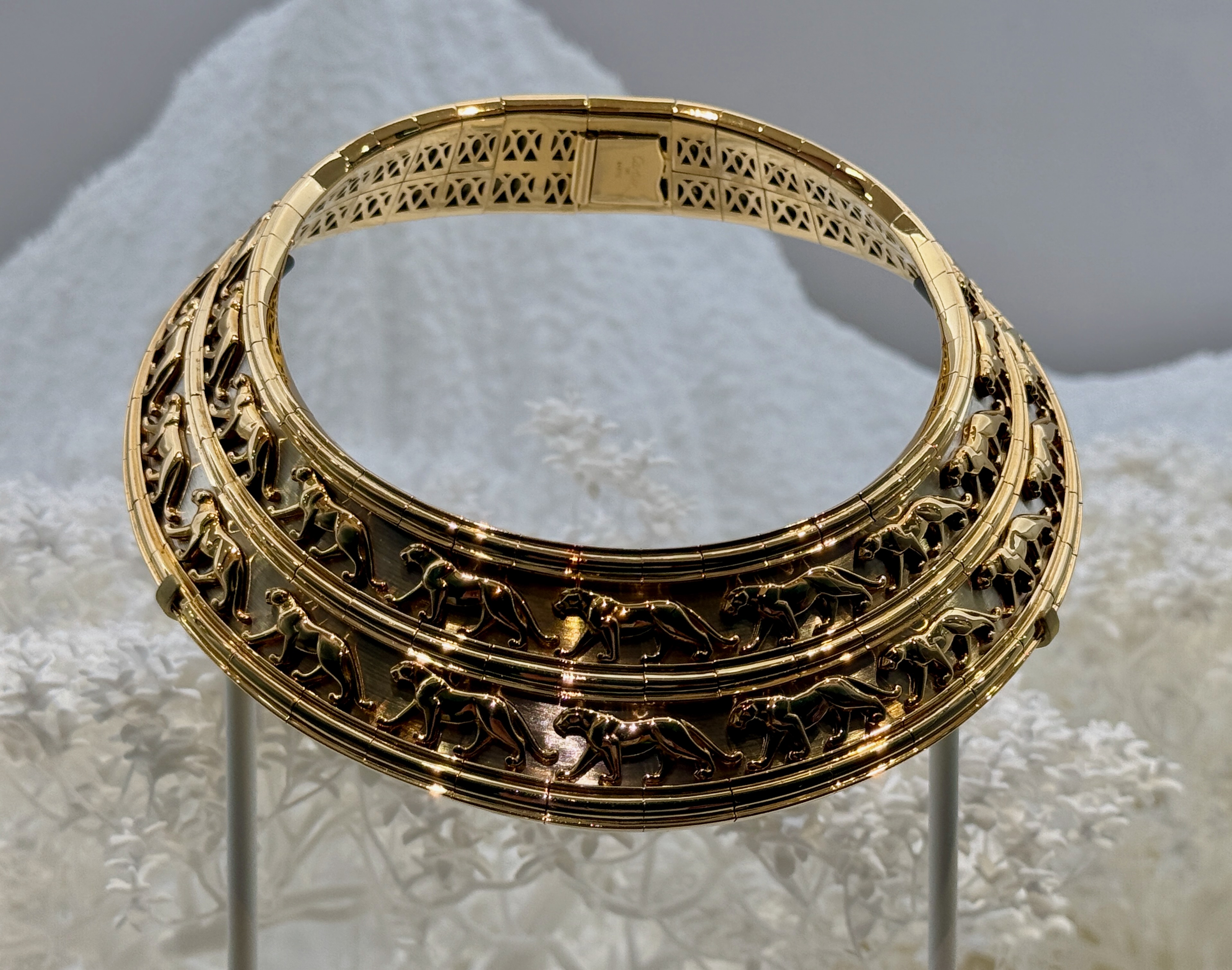 A panther decorated gold bracelet by Cartier on display at the V&A.