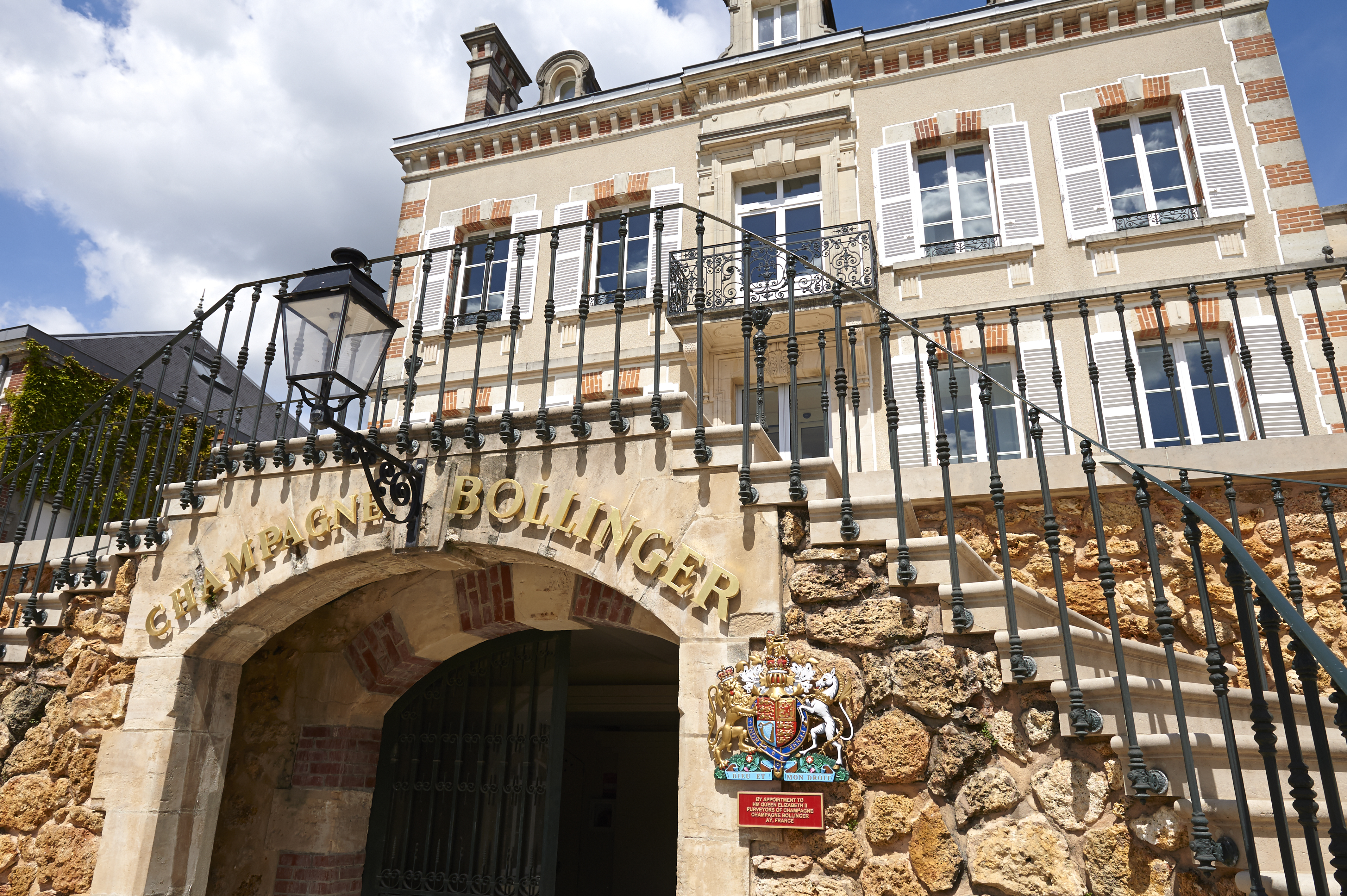 The entrance of Maison Bollinger in Aÿ in Champagne displaying the Bollinger Royal Warrant.