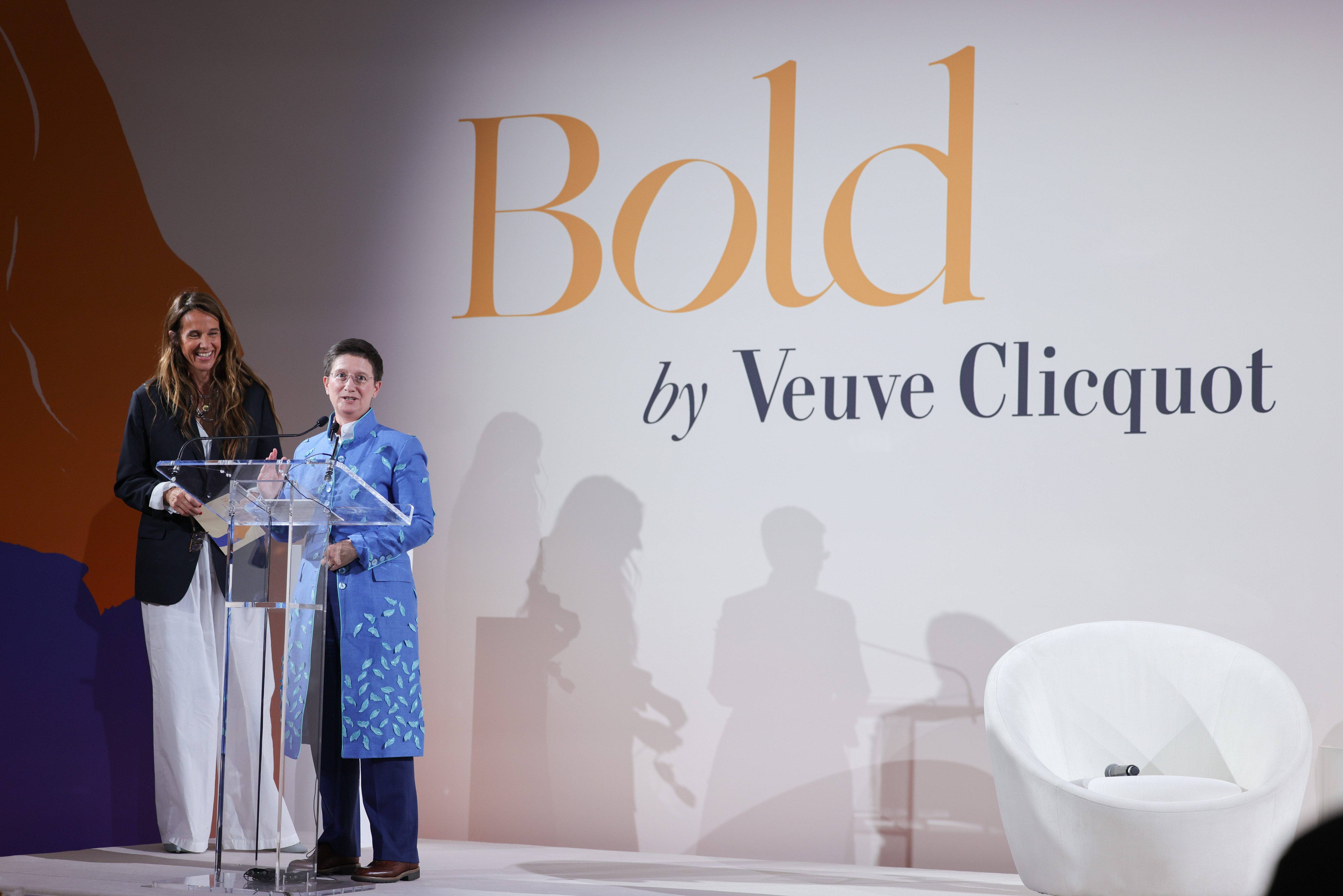 Julia Hoggett receiving the Bold Woman Award from Carole Bilde at the Veuve Clicquot Bold Woman Awards 2025.