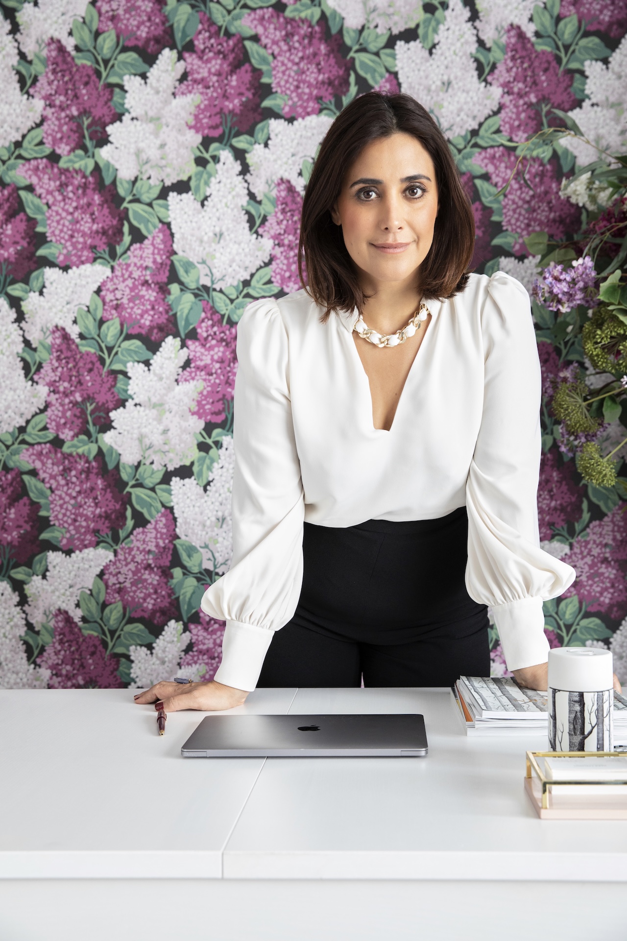 Cole & Son Royal Warrant - Marie Karlsson stood in her office.