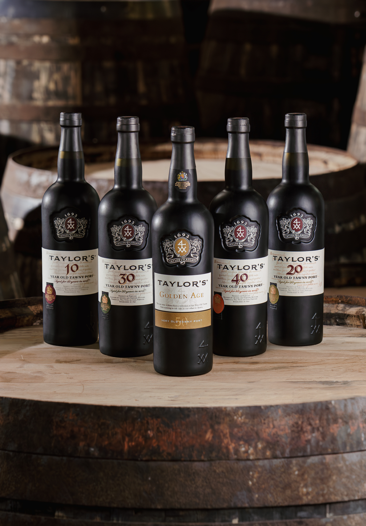 The Taylor's Port Tawny family featuring five bottles that came before Victory Taylor's Port.