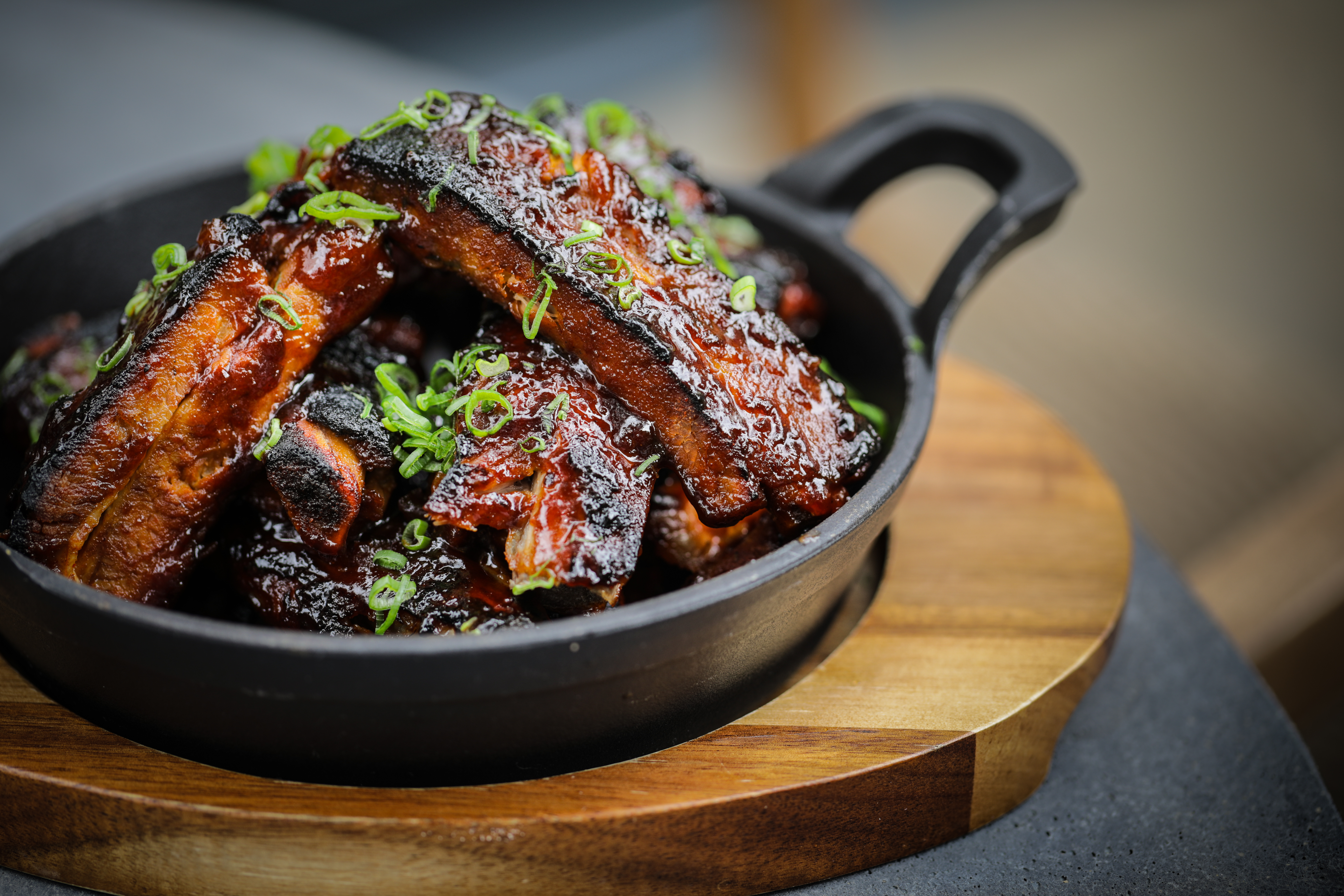Steak is served in a cast iron dish at The Aviary.