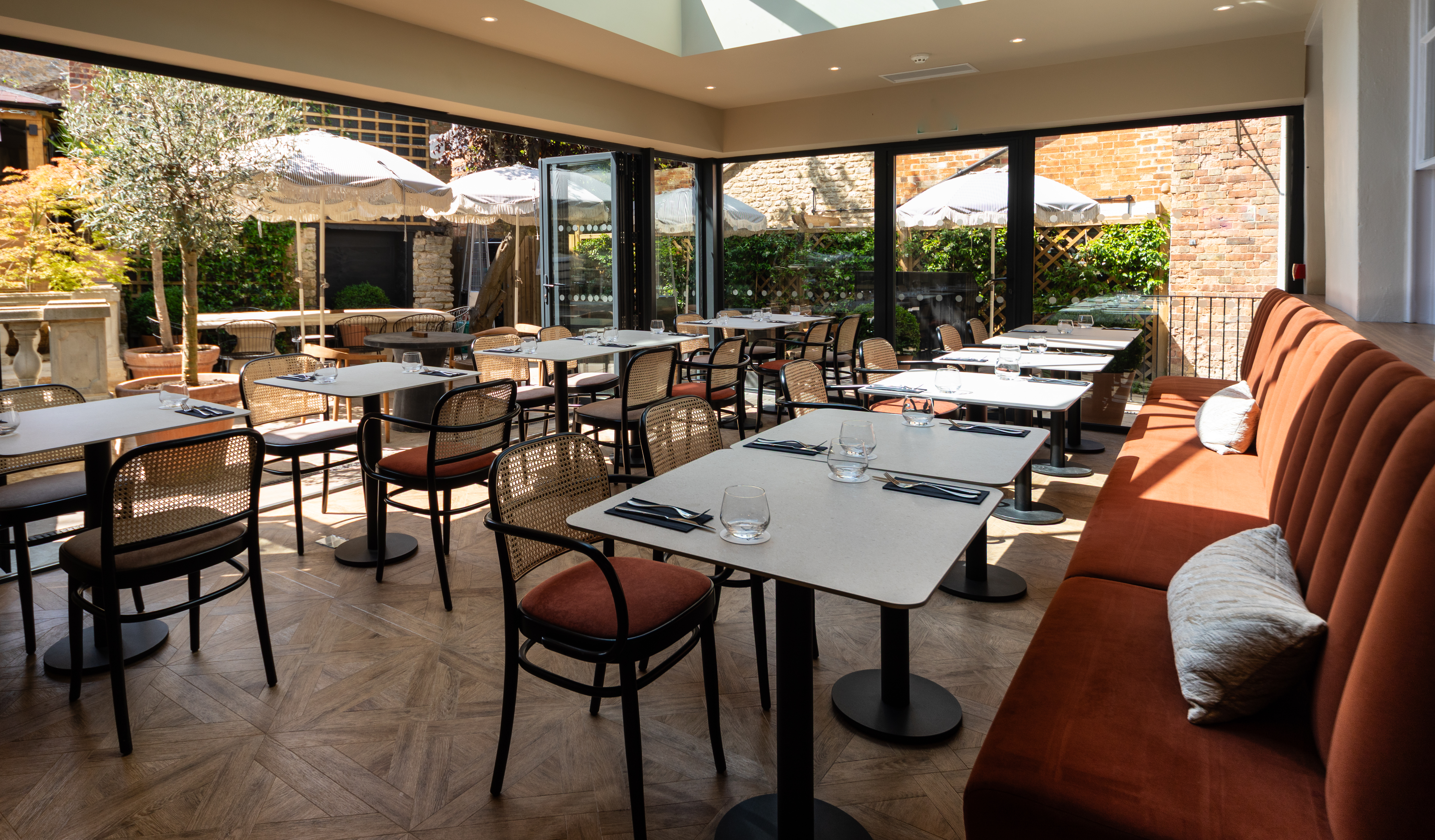 The Aviary at The Feathers inside and outside dining.
