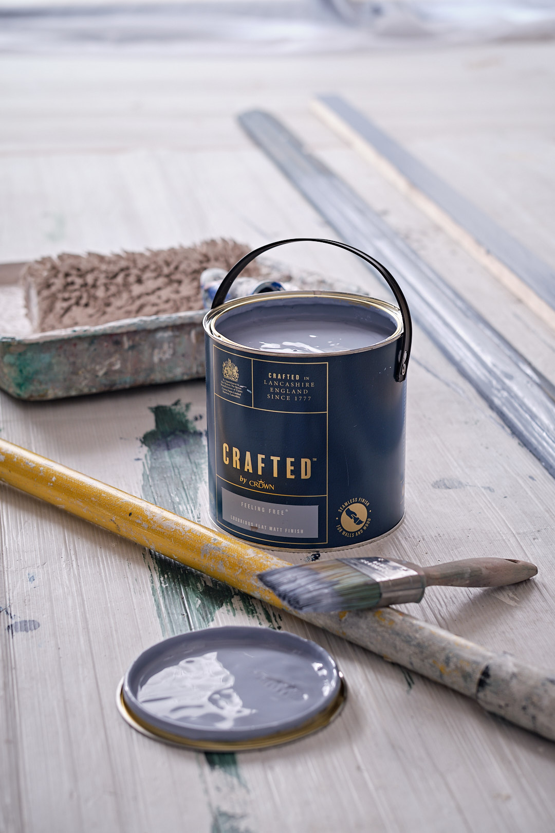 An open tin of Crafted by Crown Paints in Feeling Free.