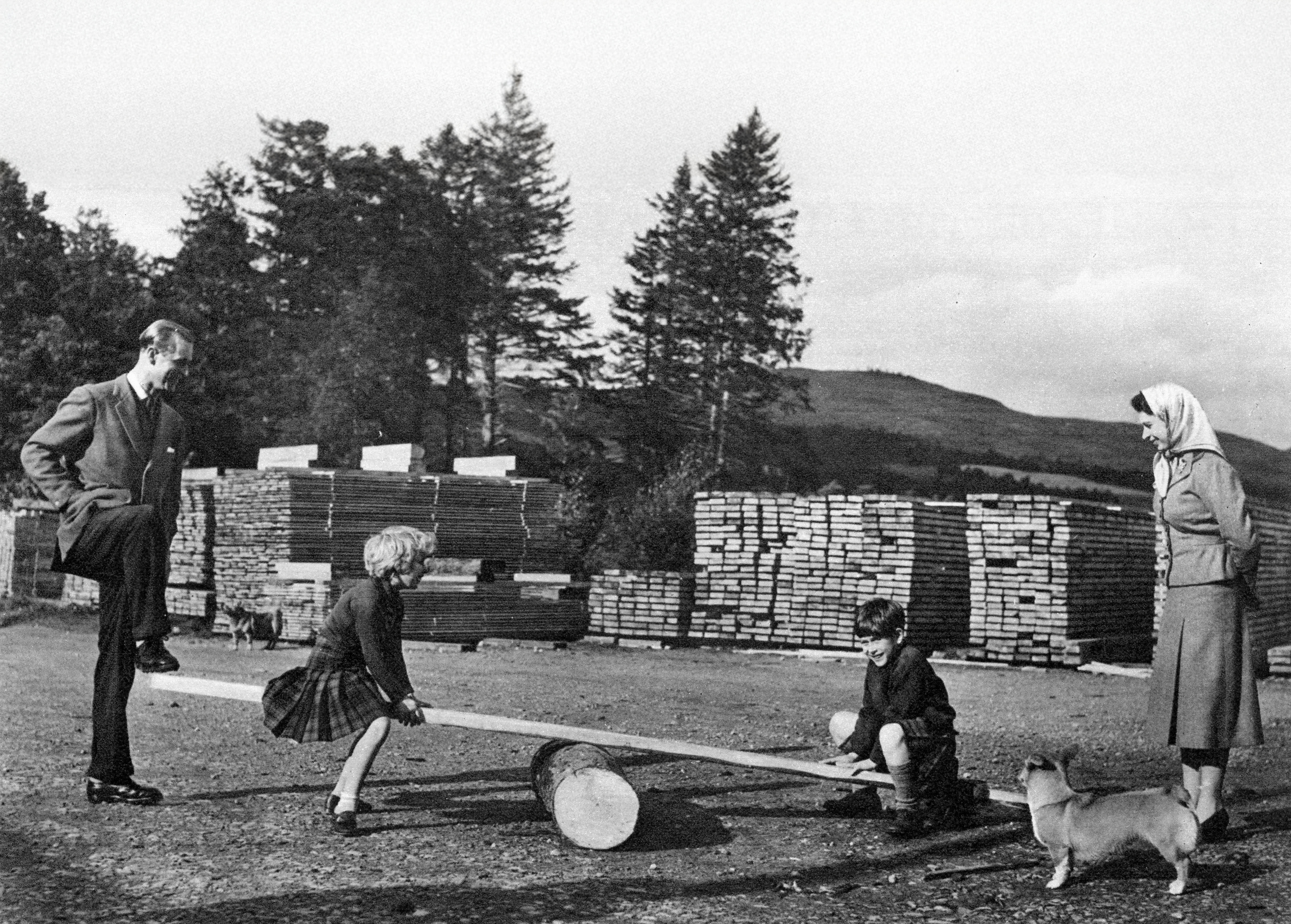 Prince Charles and Princess Anne playing in the gardens of Balmoral Castle