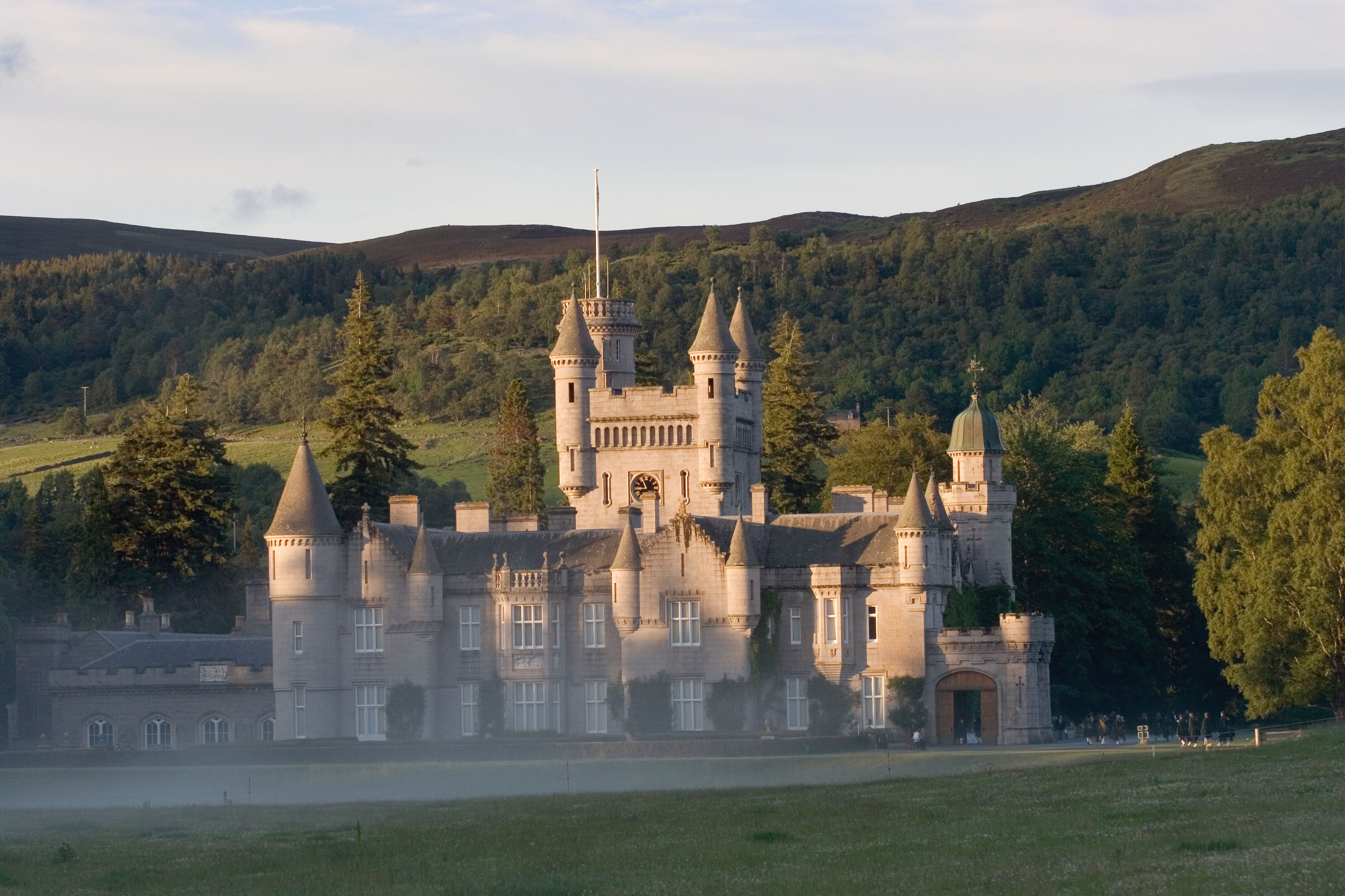 Balmoral Castle stands quietly regal in the Scottish Highlands, a dignified blend of stone, tradition and landscape wrapped in mist and memory.