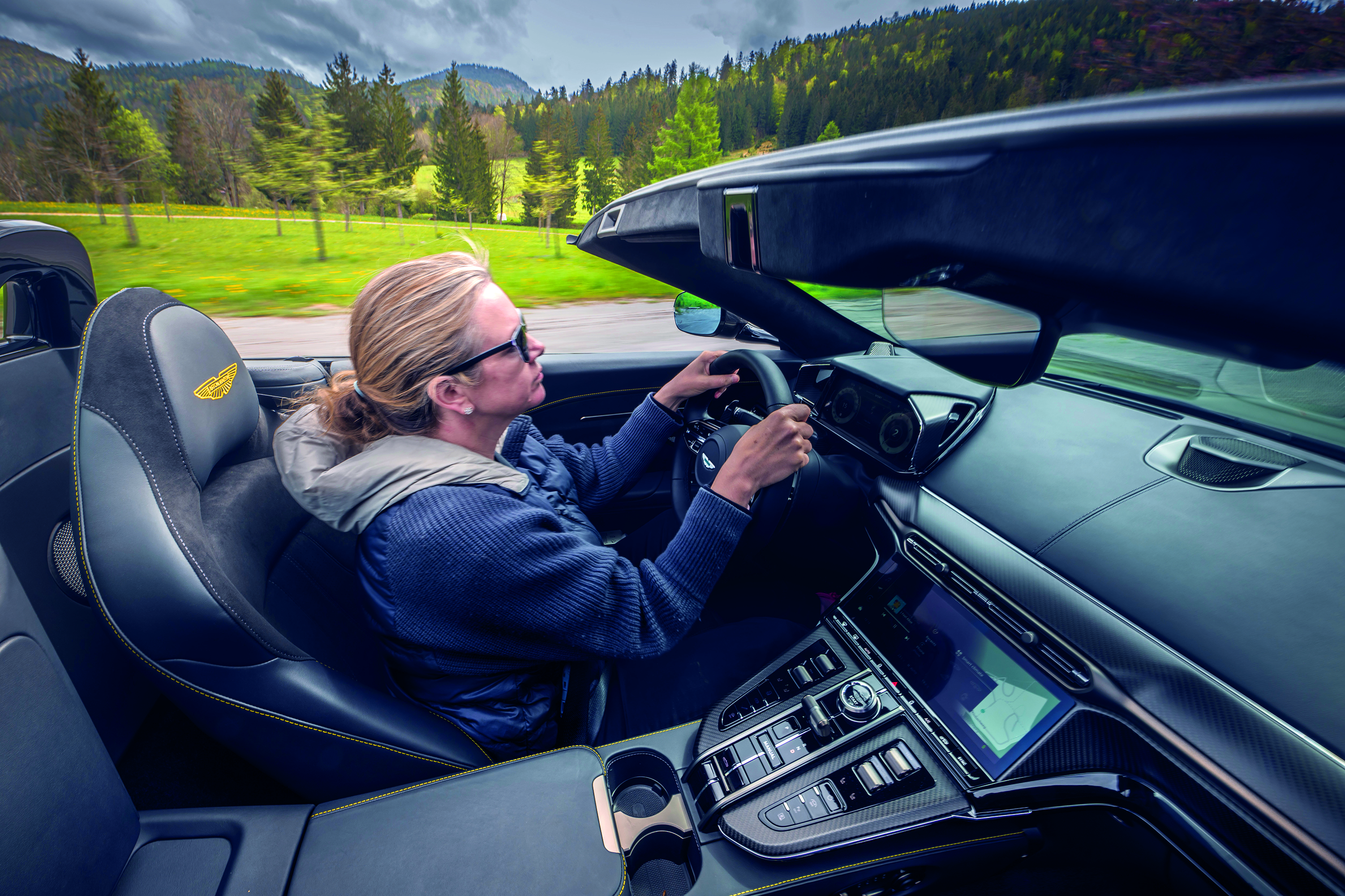 Jemima Sissons driving the Aston Martin Vantage Roadster.