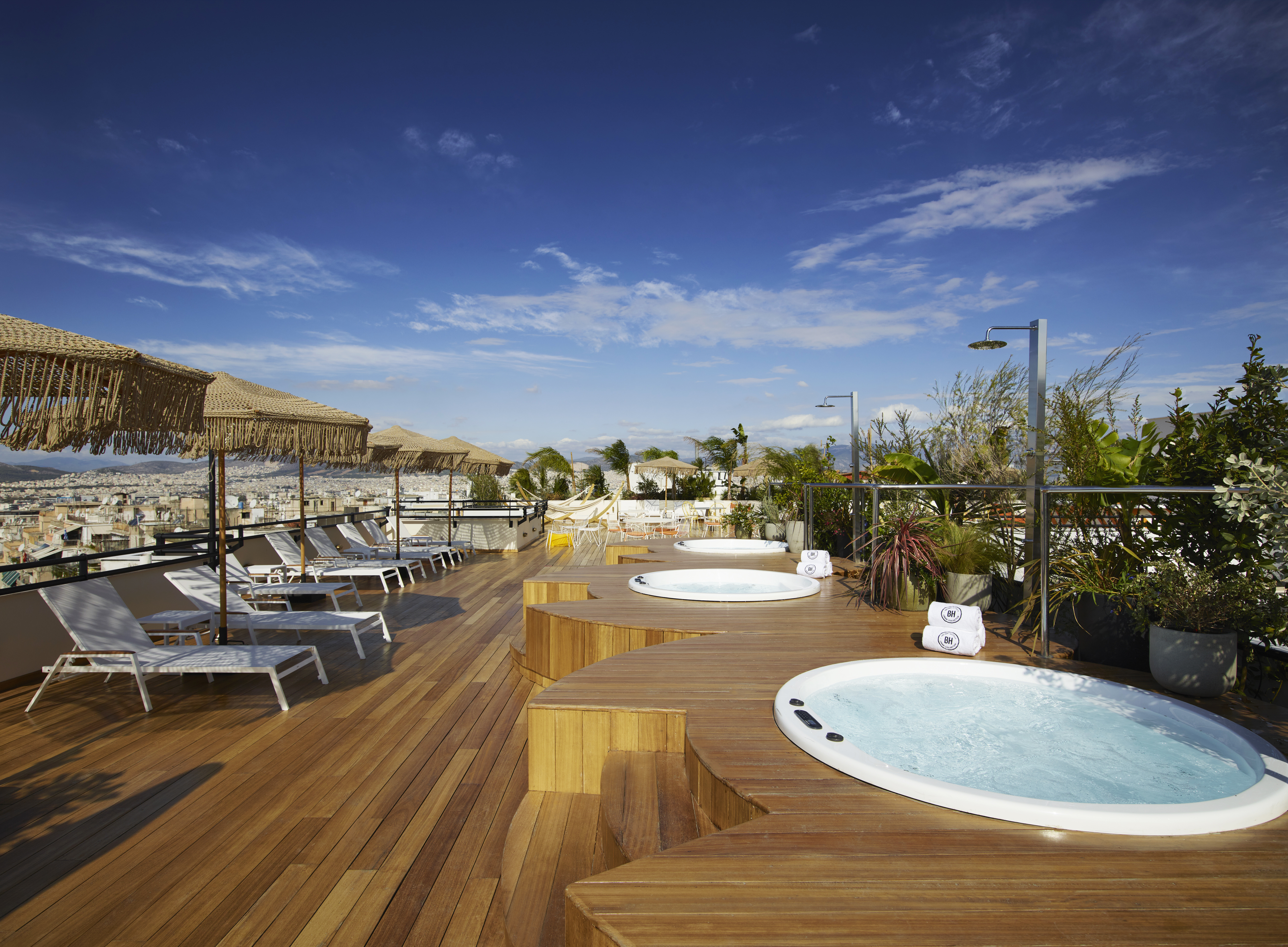 The sun loungers and roof terrace at the Brown Acropol hotel Athens.