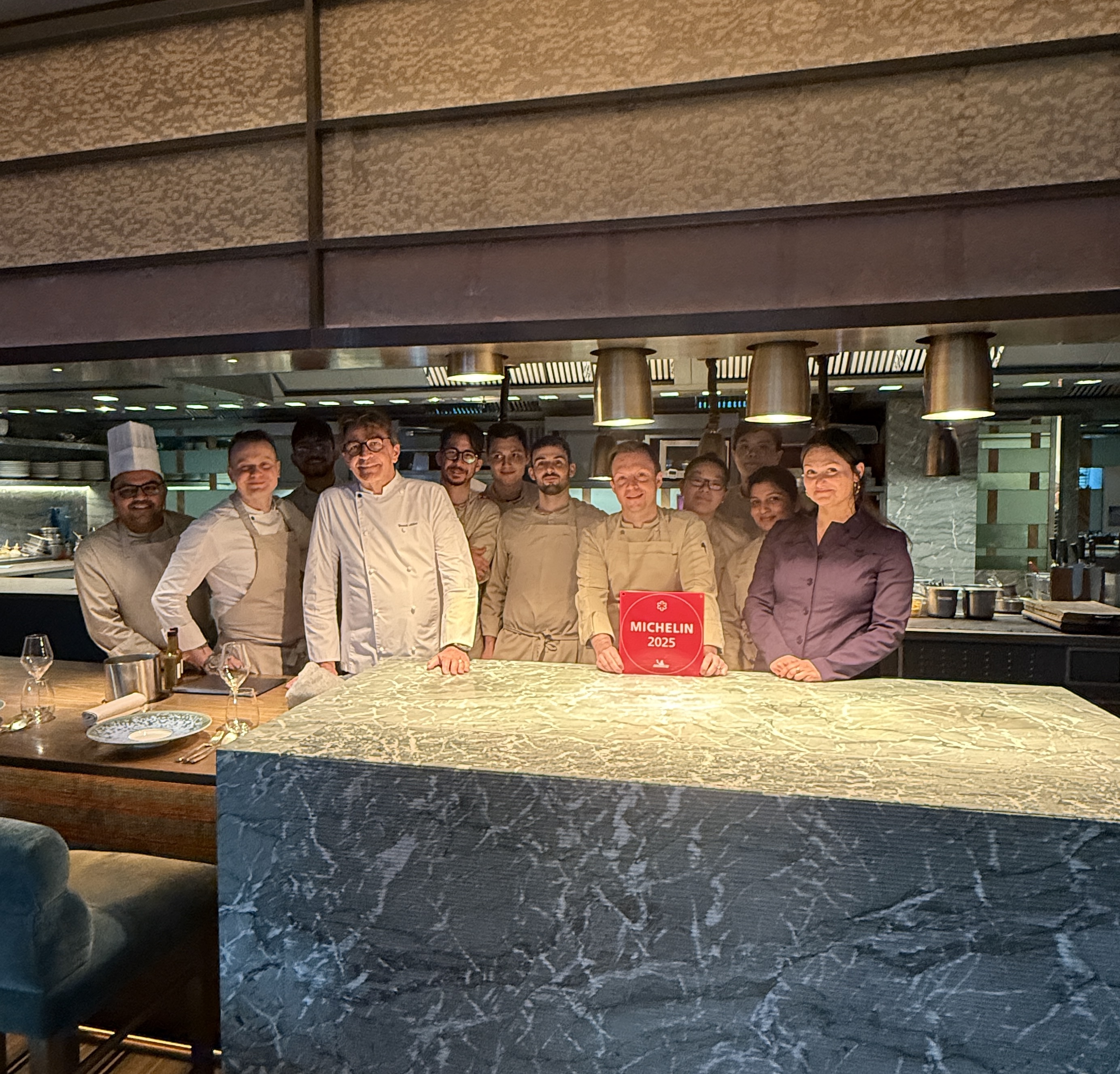 Yannick Alléno's team in the Pavyllon kitchen with their Michelin star.