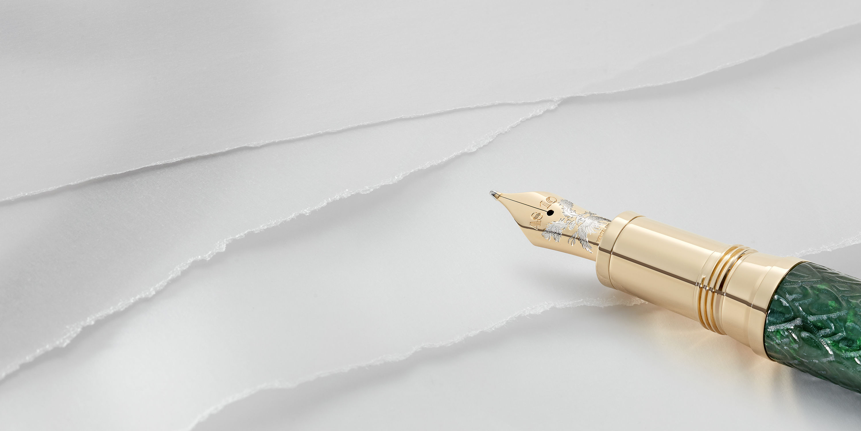 Montblanc’s Meisterstück Pen blends Champlevé enamel with a curved nib.
