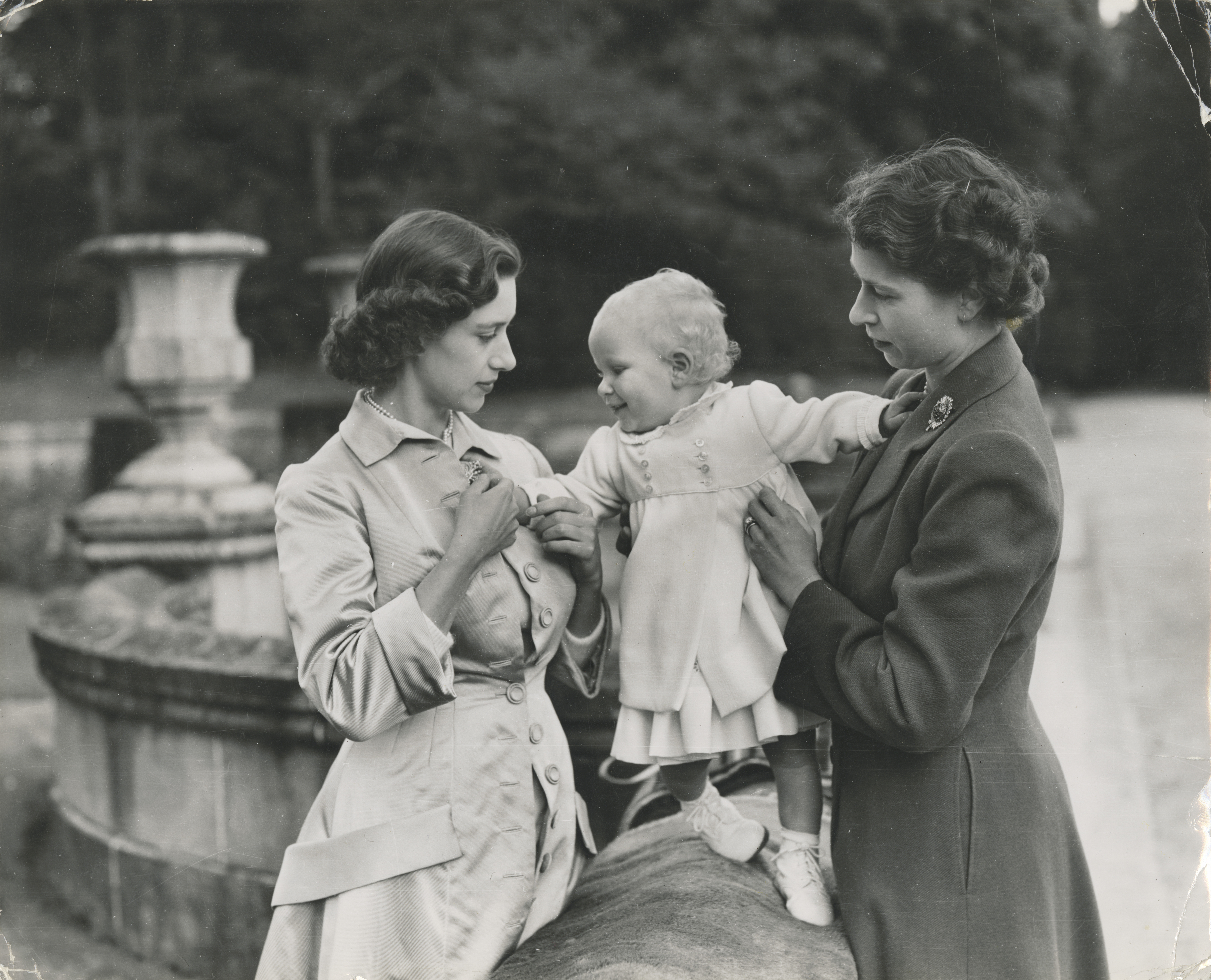 Baby princess Anne, with her mother, queen Elizabeth and Princess Margaret.  