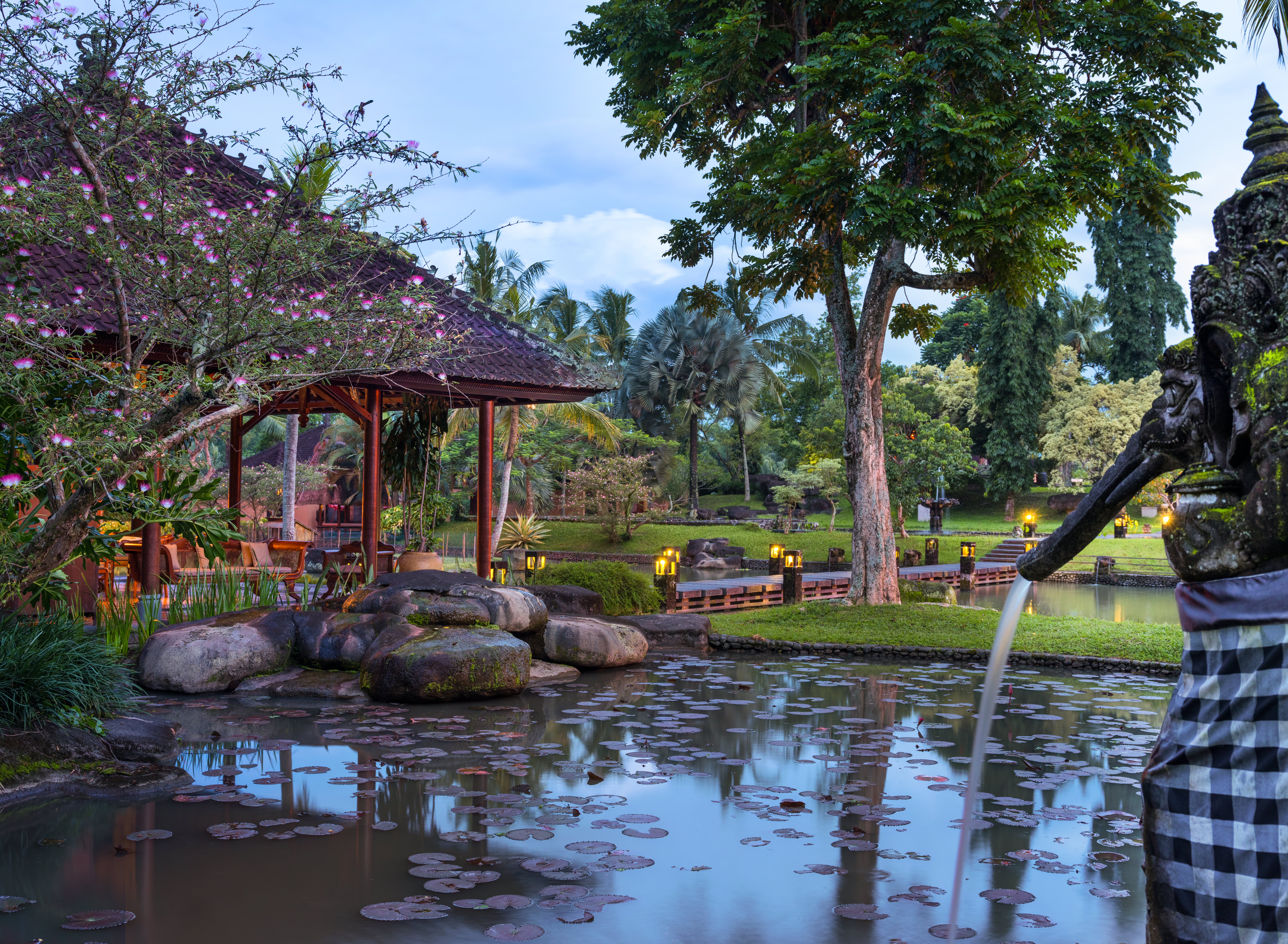 Swan pond and veranda at luxury holiday stay, Tanah Gajah.