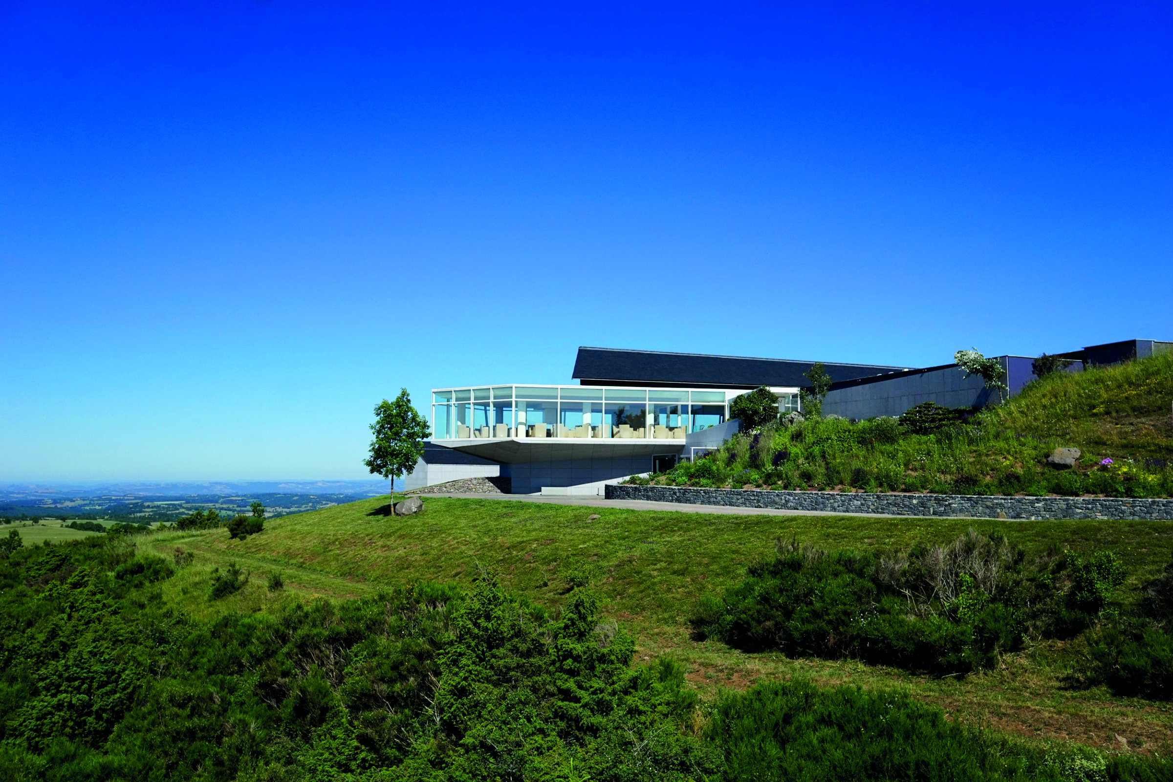 The exterior of Bras Restaurant, perched above the Aubrac hills.