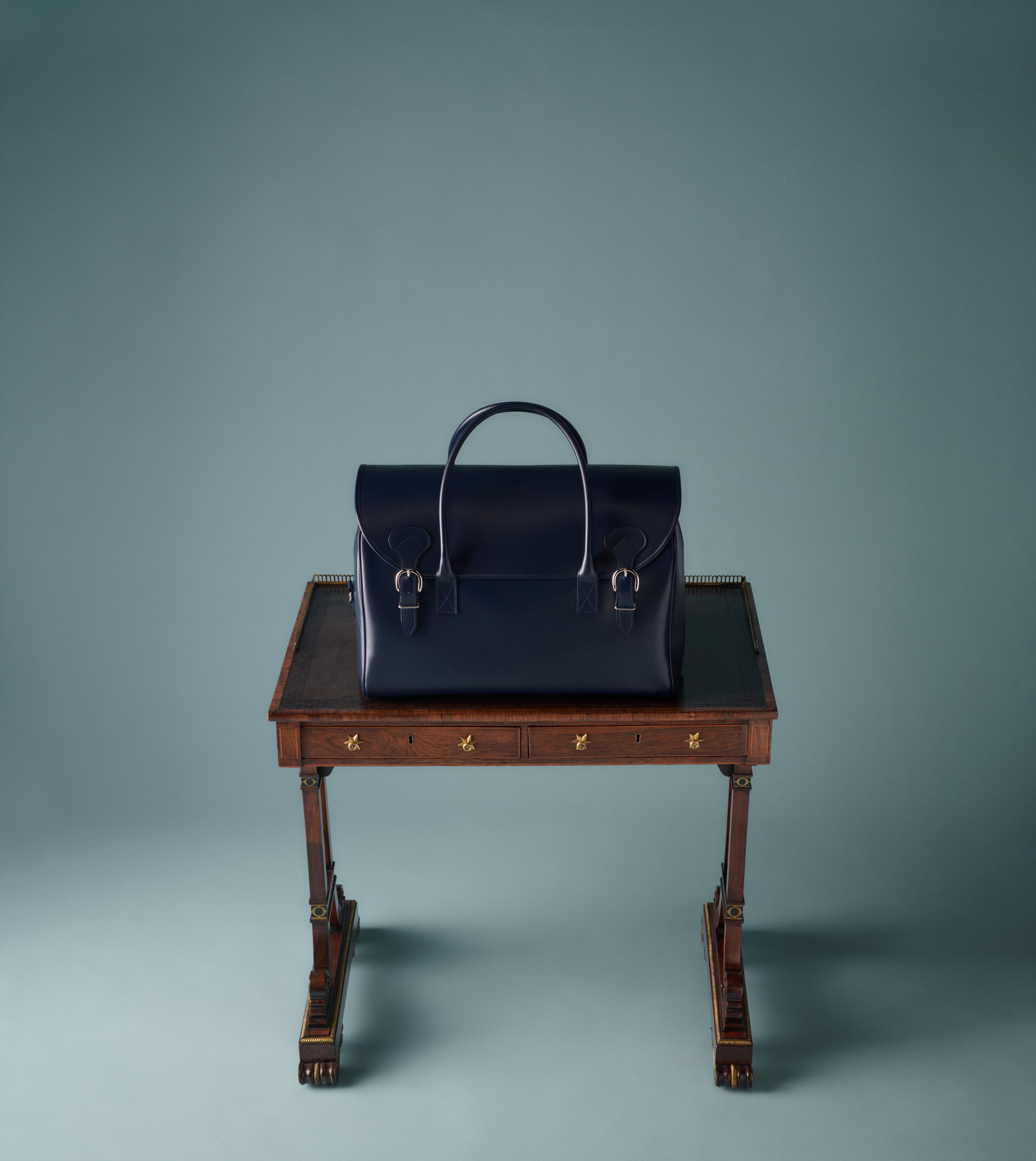 A Swaine British Artisan navy oxford bag. 