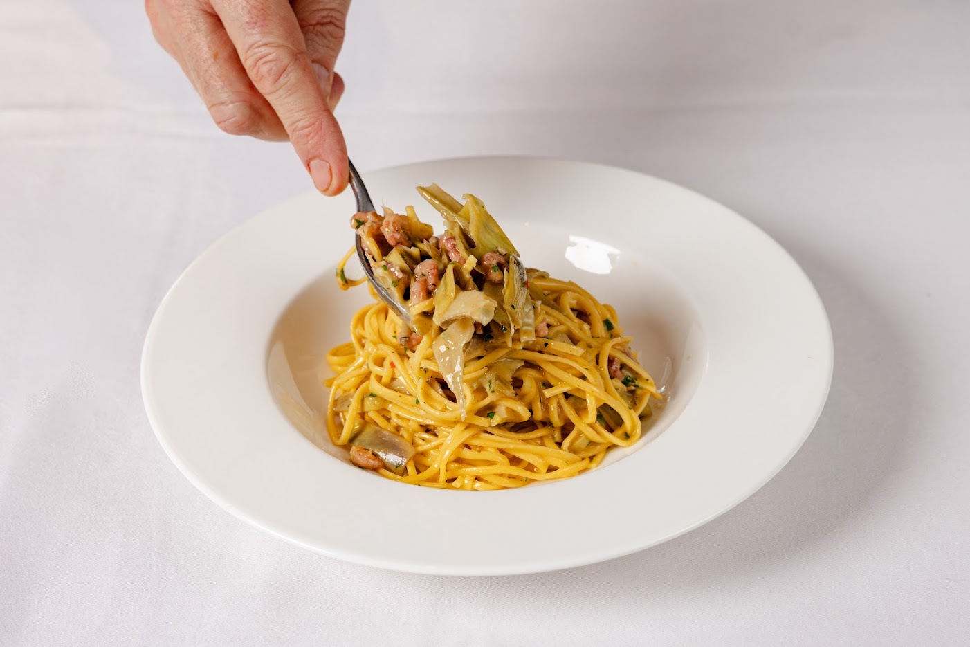 Theo recommends allowing your pasta to finish boiling in it's sauce 