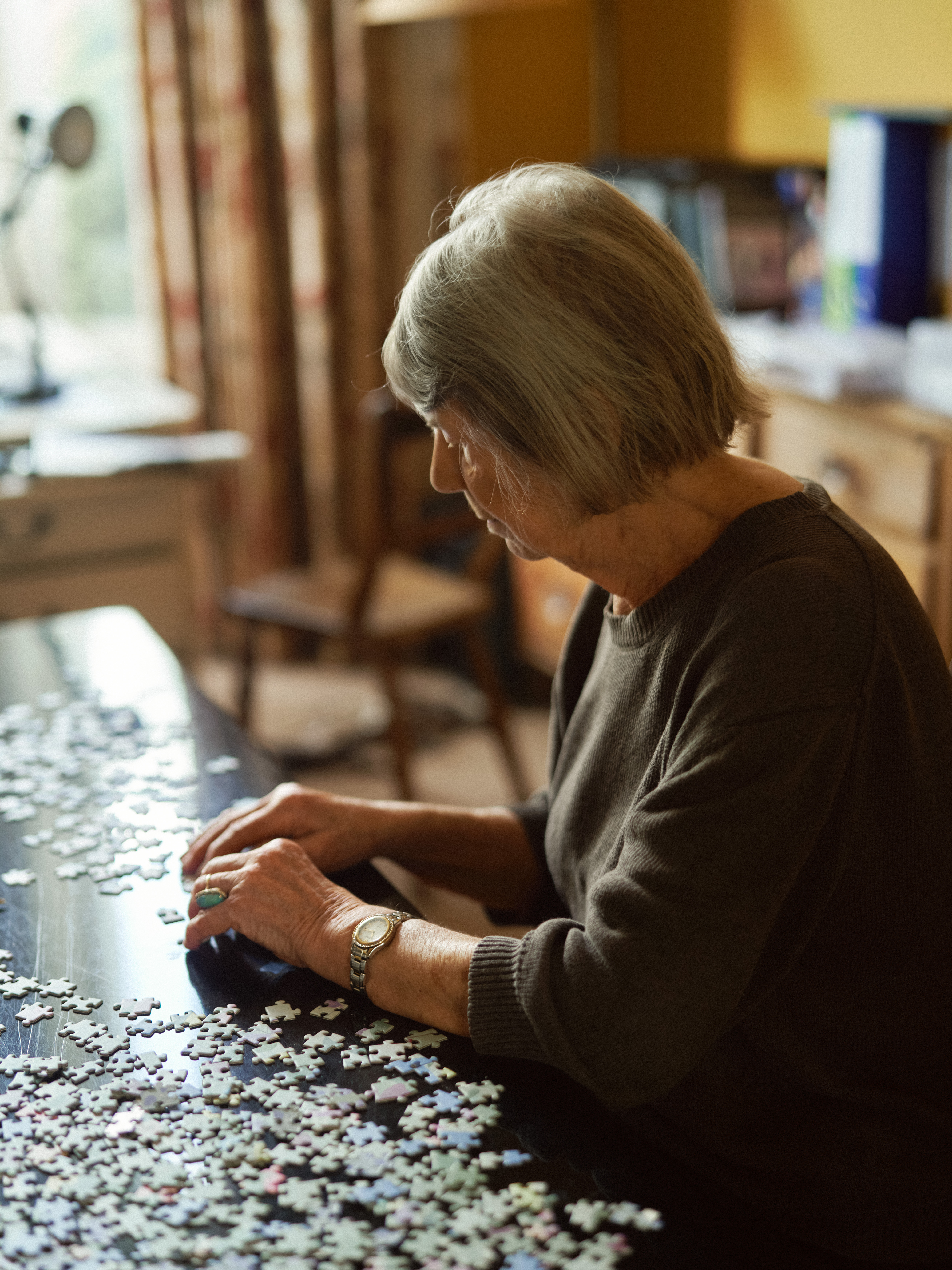 Margaret Drabble doing a puzzle. 