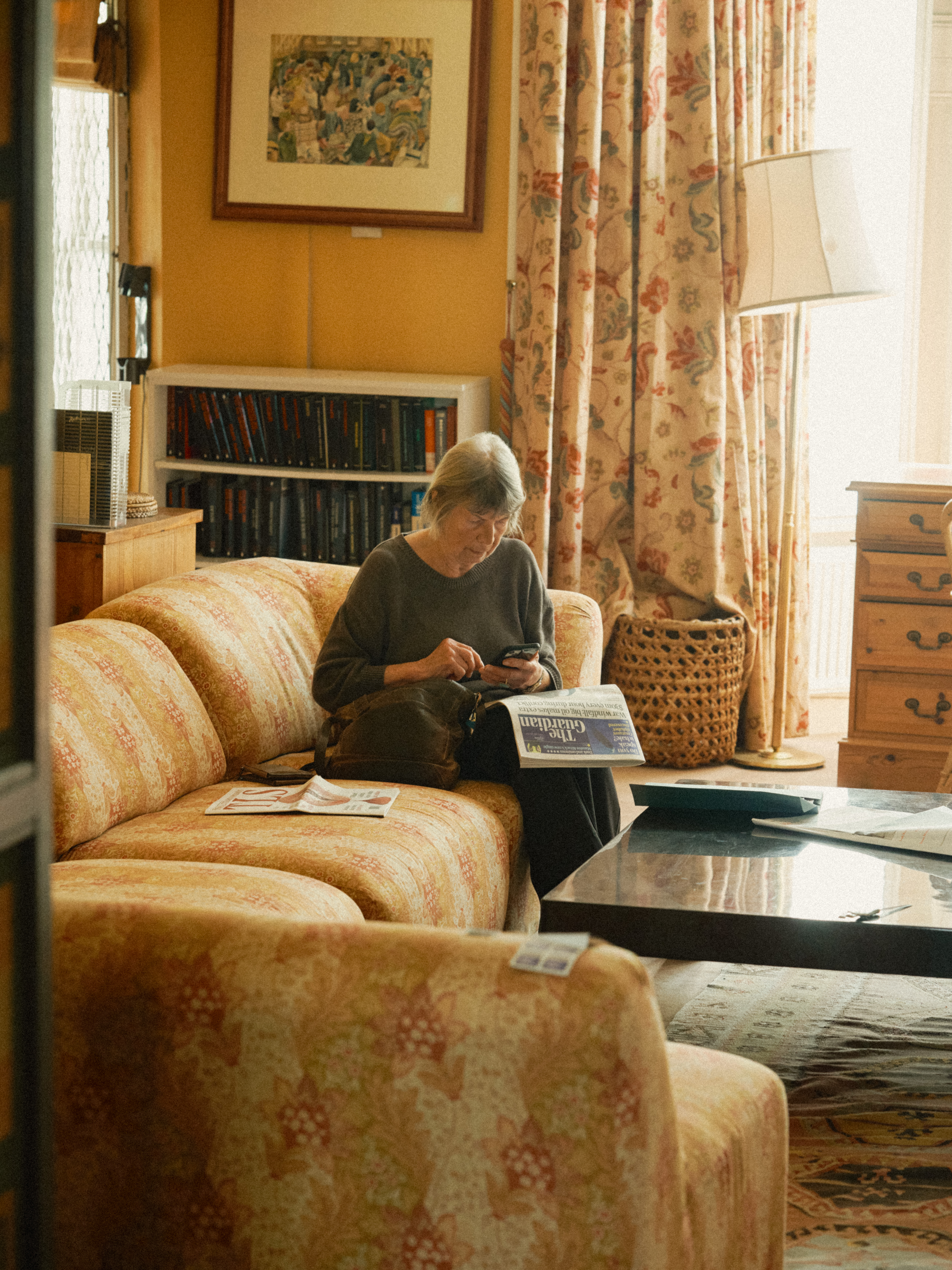 Margaret Drabble sat looking at her phone. 