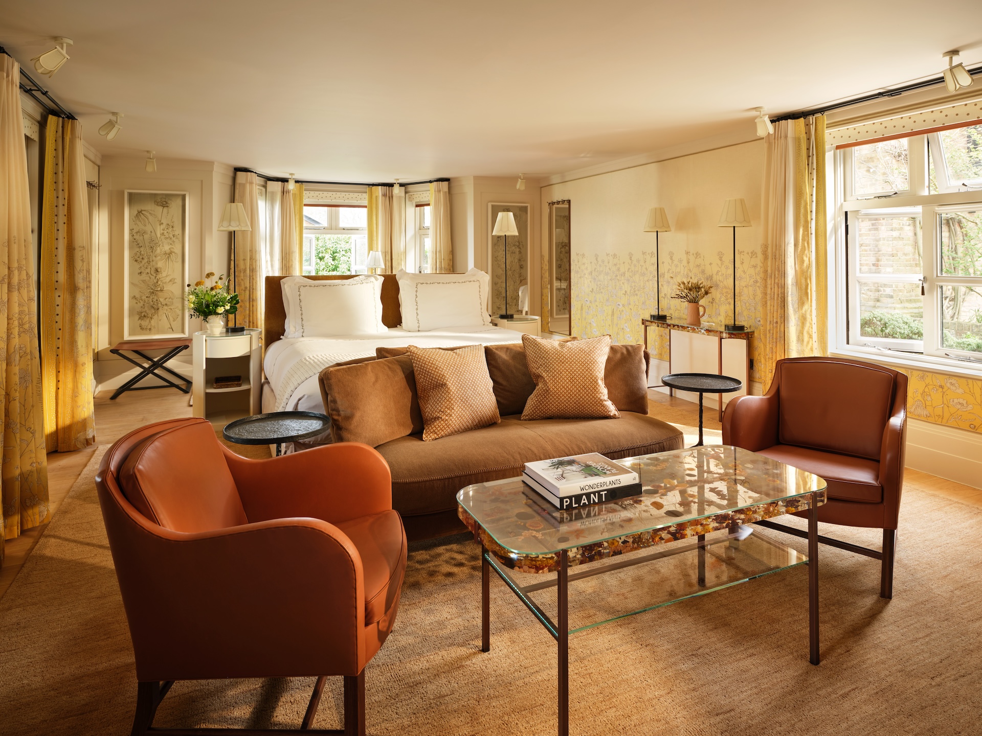 Luxury Suites in London - bedroom of a stable suite at Coworth Park. 