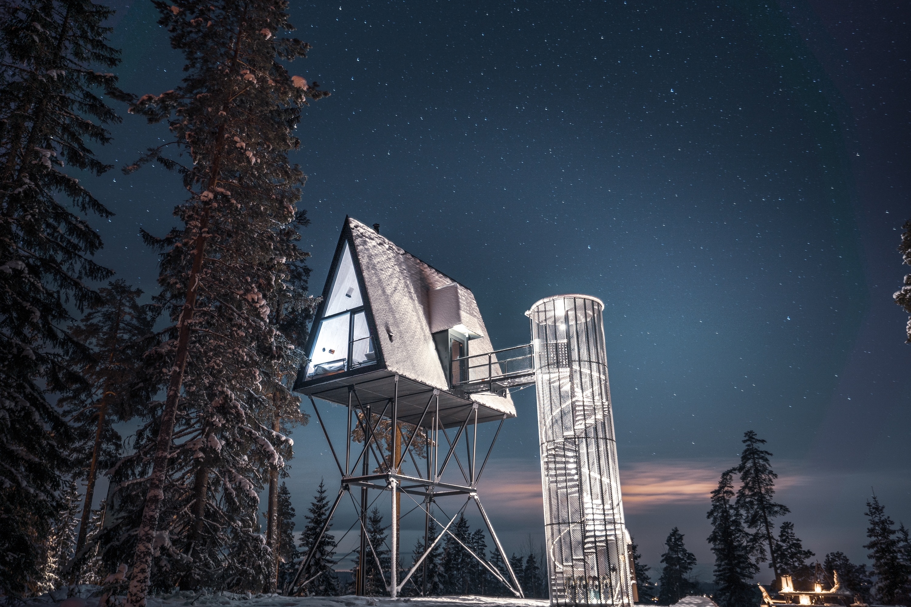 PAN's Treetop Cabins at night