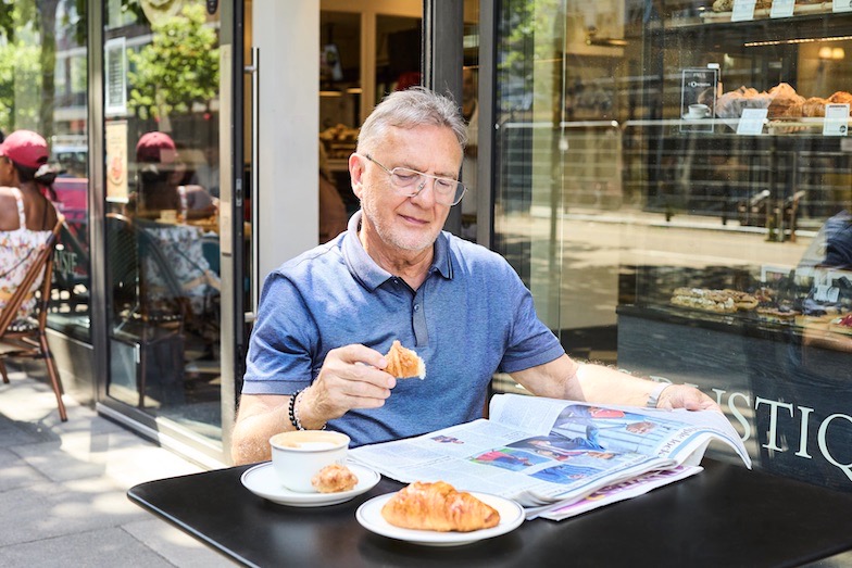 Raymond Blanc enjoying a coffee and croissant. 