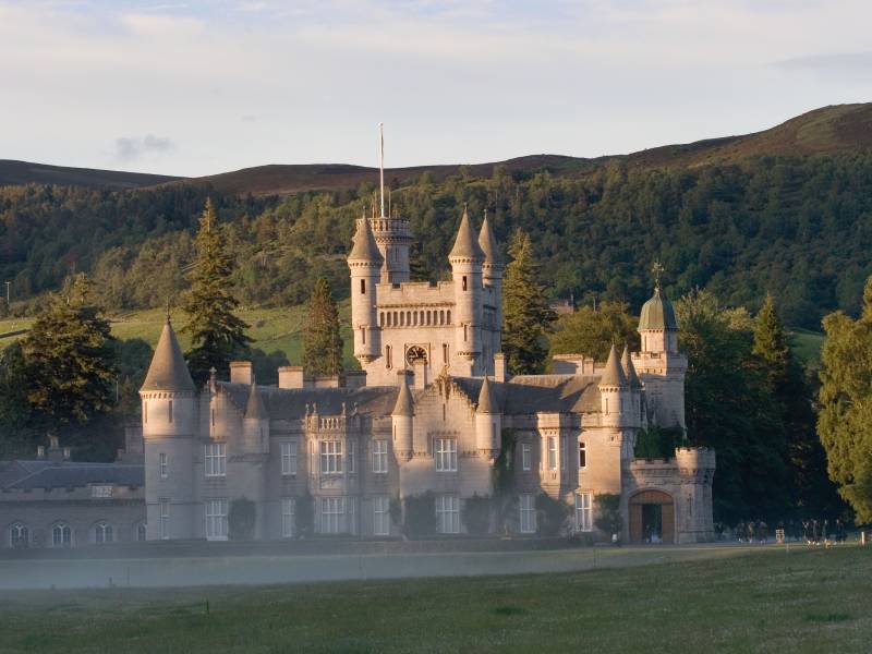 Balmoral Castle stands quietly regal in the Scottish Highlands, a dignified blend of stone, tradition and landscape wrapped in mist and memory.
