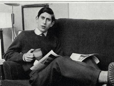 Prince Charles reading Illustrated London News at Cambridge University