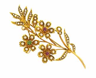 Grays Antiques Victorian yellow gold flower spray brooch set with seed pearls, rubies and emeralds, £550